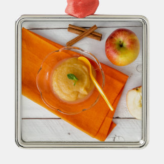 Appelmoes met kaneel en sinaasappels lepeltje metalen ornament