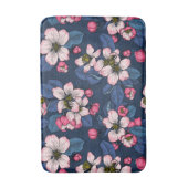 Apple bloesem op een donkerblauw badmat (Voorkant Verticaal)