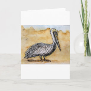 Aquarelle d'un pélican sur une carte de vœux pliée