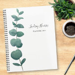 Aquarelle personnalisée Eucalyptus<br><div class="desc">Cet élégant Planner est décoré d'un seul jet d'eucalyptus aquarelle. Customisez-le avec votre nom et votre année. Parce que nous créons notre propre oeuvre,  vous ne trouverez pas cette image exacte d'autres designers. Aquarelle originale © Michele Davies.</div>