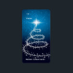 Arbre de Noël sur Étiquette bleu brillant<br><div class="desc">Un design de Noël élégant et élégant,  avec un arbre de Noël abstrait et des étoiles sur un arrière - plan bleu brillant. Personnalisez-le avec votre texte.</div>