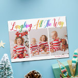 Arc-en-ciel joyeux Noël 3 Photo Magnet Card<br><div class="desc">Magnifique,  coloré 3 photo carte magnétique de Noël avec Laughing All the Way en joli arc-en-ciel écriture cursive. Personnalisez avec vos trois photos de famille verticales préférées de vos enfants souriants au-dessus de votre nom ou salutation personnalisée en rouge. Cartes magnétiques de vacances amusantes et joyeuses.</div>
