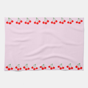 Arêtes de cerise sur les serviettes de cuisine ros
