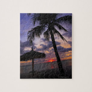 Aruba, silhouet van palmbomen en palapa legpuzzel