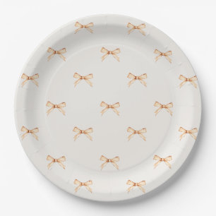 Assiette en papier beige pastel avec motif de nœud