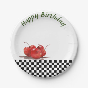 Assiettes En Carton Cerises rouges brillantes sur une nappe à carreaux