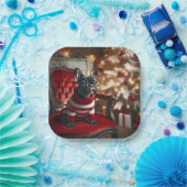 Assiettes En Carton Chien de taureau noir de Noël sur une chaise rouge (Fête)