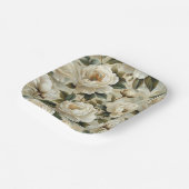 Assiettes En Carton Fleurs blanches sur un arrière - plan crème. (Angulaire)