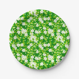 Assiettes En Carton Jasmin blanc parmi les feuilles verts