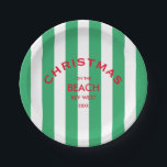 Assiettes En Carton Noël Sur La Plage Green Cabana Stripe<br><div class="desc">Ces plaques en papier sont parfaites pour vos fêtes de Noël, fêtes et rassemblement sur la plage... Bandes de cabane vert avec logo de plage personnalisé rouge. Personnalisez avec l'emplacement de la plage et l'année. L'ajout parfait à vos réunions de Noël ! Accessoires correspondants disponibles dans la collection Christmas On...</div>