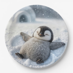 Assiettes En Carton Petit pingouin de Noël faisant un ange de neige