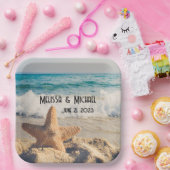 Assiettes En Carton Starfish sur une plage de sable Photo (Fête)