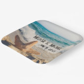 Assiettes En Carton Starfish sur une plage de sable Photo (Angulaire)