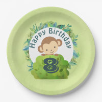 Un singe qui sort de derrière un anniversaire de B
