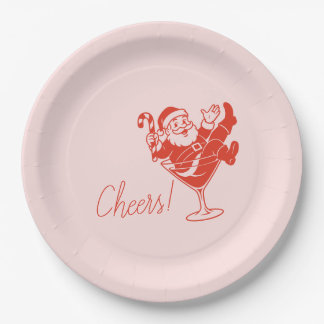 Assiettes en papier avec le Père Noël dans un verr
