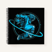 Astronaut Jumping Around Saturn Artwork | Notitieboek (Voorkant)