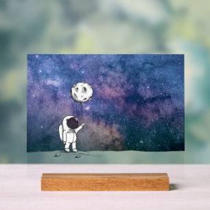 Astronaute dans l'espace avec ballon lunaire cosmo