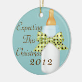 Attendre cet ornement de Noël (Gauche)