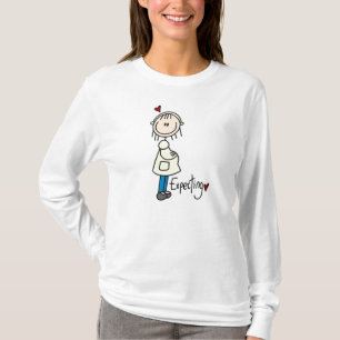 Attendre le T-shirts et les cadeaux de bébé