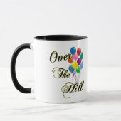 Au-dessus des tasses d'anniversaire de colline et (Gauche)