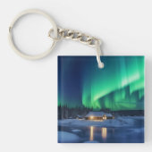 Aurora borealis boven winterhut sleutelhanger (voorkant)