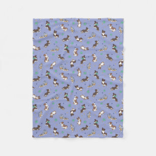 Australian Shepherd speelt leuke fleece deken