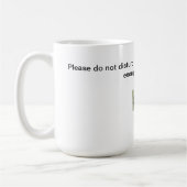 Auteur à la tasse de travail (Gauche)