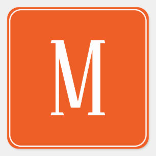 Autocollant carré blanc sur orange vif avec monogr