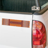 un motif de point de croix en orange et marron