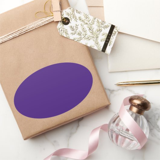 Autocollant ovale violet monstre (Cadeaux)