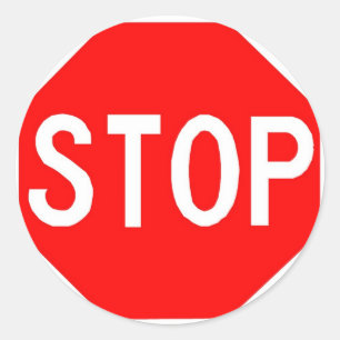 Autocollant rond avec panneau Stop.