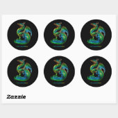 autocollant rond avec un dragon rayonnant coloré (Feuille)