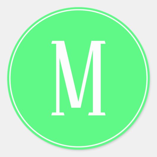 Autocollant rond blanc sur fond vert clair avec mo (Devant)