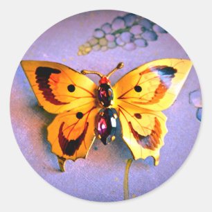 Autocollant rond classique papillon jaune orné de