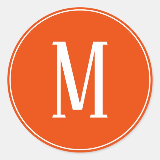 Autocollant rond orange vif avec monogramme blanc (Devant)