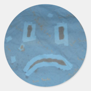 Autocollant triste de visage