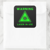 Autocollant vert et noir de signe d'alerte laser (Sac)