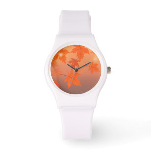 Autumn design with maple leaves and bokeh effect horloge