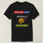 Baanbrekende berichten dat ik echt honger heb t-shirt (Design voorkant)