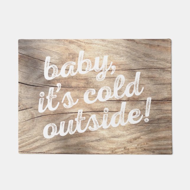 baby, het is koud buiten. over de achtergrond van  deurmat (Voorkant)