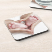 Baby in de handen van de moeder bier onderzetter (Linkerzijde)