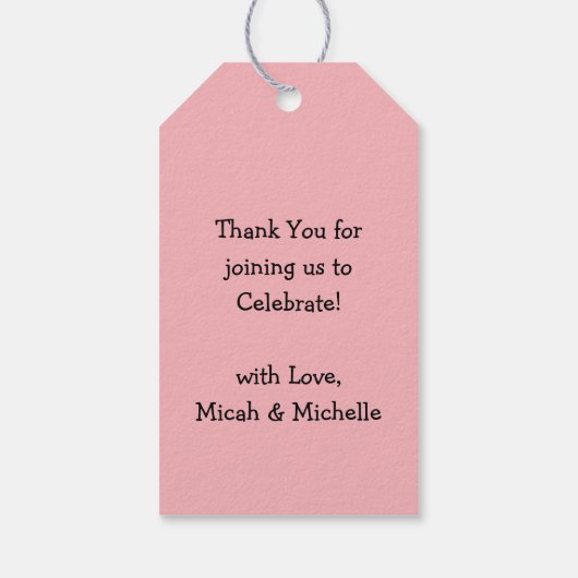 Baby is een gradenschoen met een gothisch roze mei cadeaulabel (Achterkant)