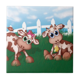 Baby koeien aan een heuvelzijde met witte omheinin tegeltje