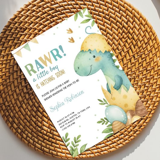 Baby shower invitation featuring a dinosaur 