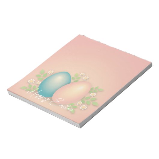 Babyblauwe en roze eitjes en lentemeel notitieblok (Gedraaid)