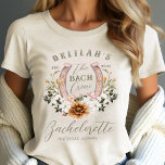 Bach Crew Western Floral Horseshoe Bachelorette<br><div class="desc">Entrez dans le style avec notre superbe chemise tricolore "The Bach Crew" cowgirl en fer à cheval western Bachelorette partie! Alliant parfaitement confort et charme, cette chemise est conçue pour la mariée moderne qui célèbre son esprit unique. Parfait pour une Bachelorette à thème occidental, pour mettre en valeur votre amour...</div>