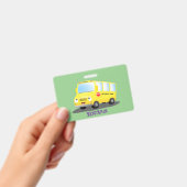 Badge Caricature du bus scolaire jaune joyeux (Handheld)