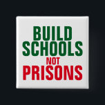 Badge Carré 5 Cm Construire l'école et non les prisons<br><div class="desc">Construisez des écoles et non des prisons.</div>