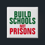 Badge Carré 5 Cm Construire l'école et non les prisons<br><div class="desc">Construisez des écoles et non des prisons.</div>