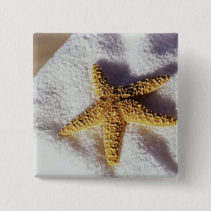 Badge Carré 5 Cm Étoiles de mer sur une serviette